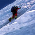 A Climber Crossing a Bergshrund on Everest